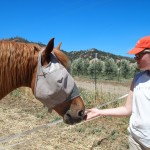 Kristen feeds Lucy a treat